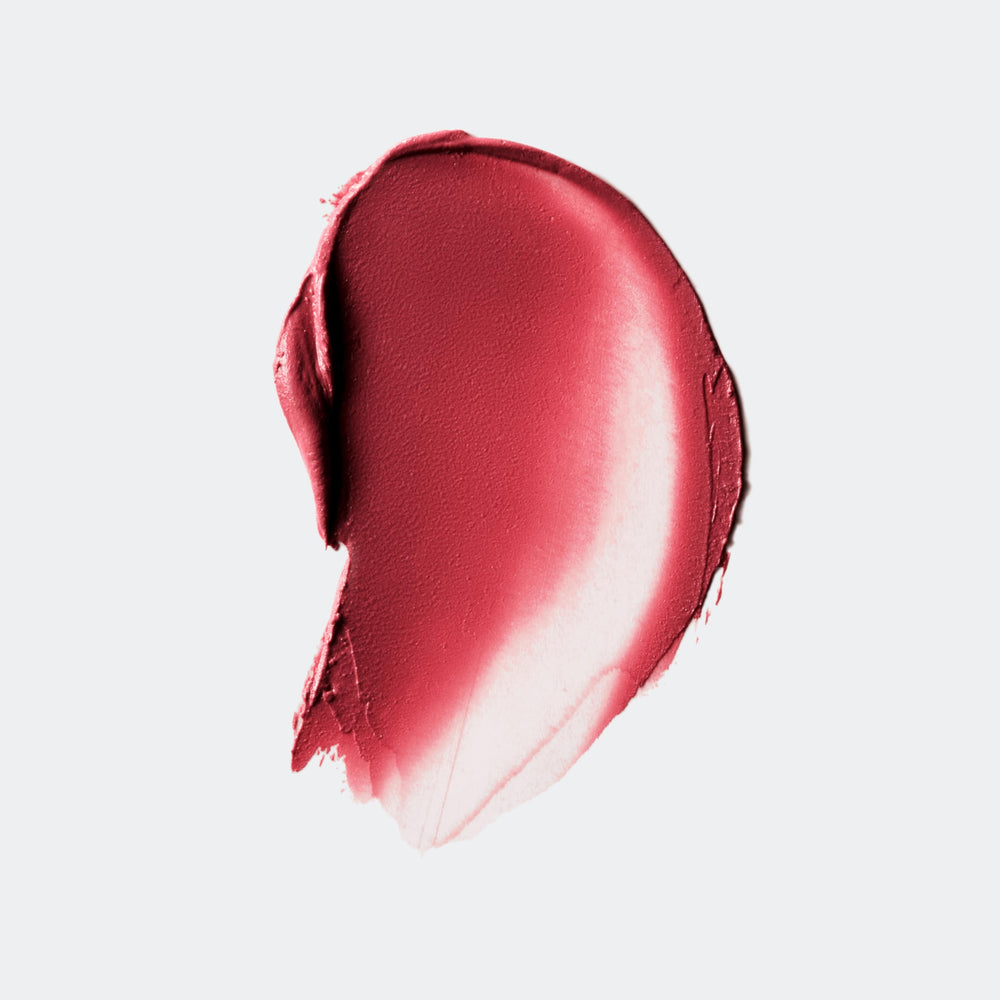 Close-up of Clinique cap detail highlighting secure closure and travel-ready design