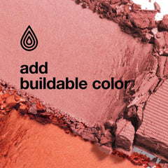 Clinique blusher brush next to New Clover swatch demonstrating smooth blendability and natural finish