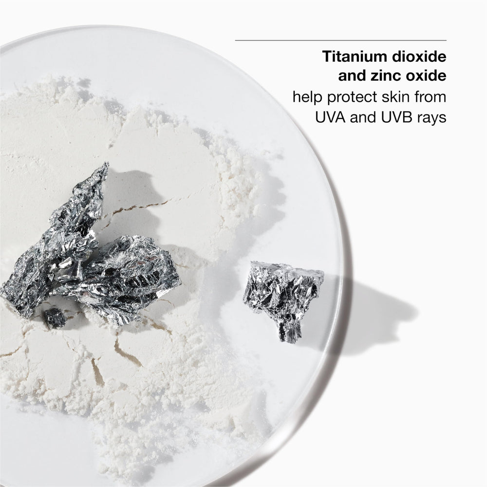 Clinique sunscreen applied on hand demonstrating blendability and quick absorption