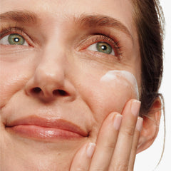 Clinique open jar cream texture close-up highlighting smooth, hydrating finish