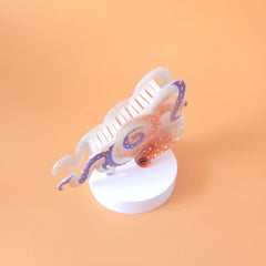 Clip Sugar clipping a casual updo showing reliable hold and stylish accent benefit