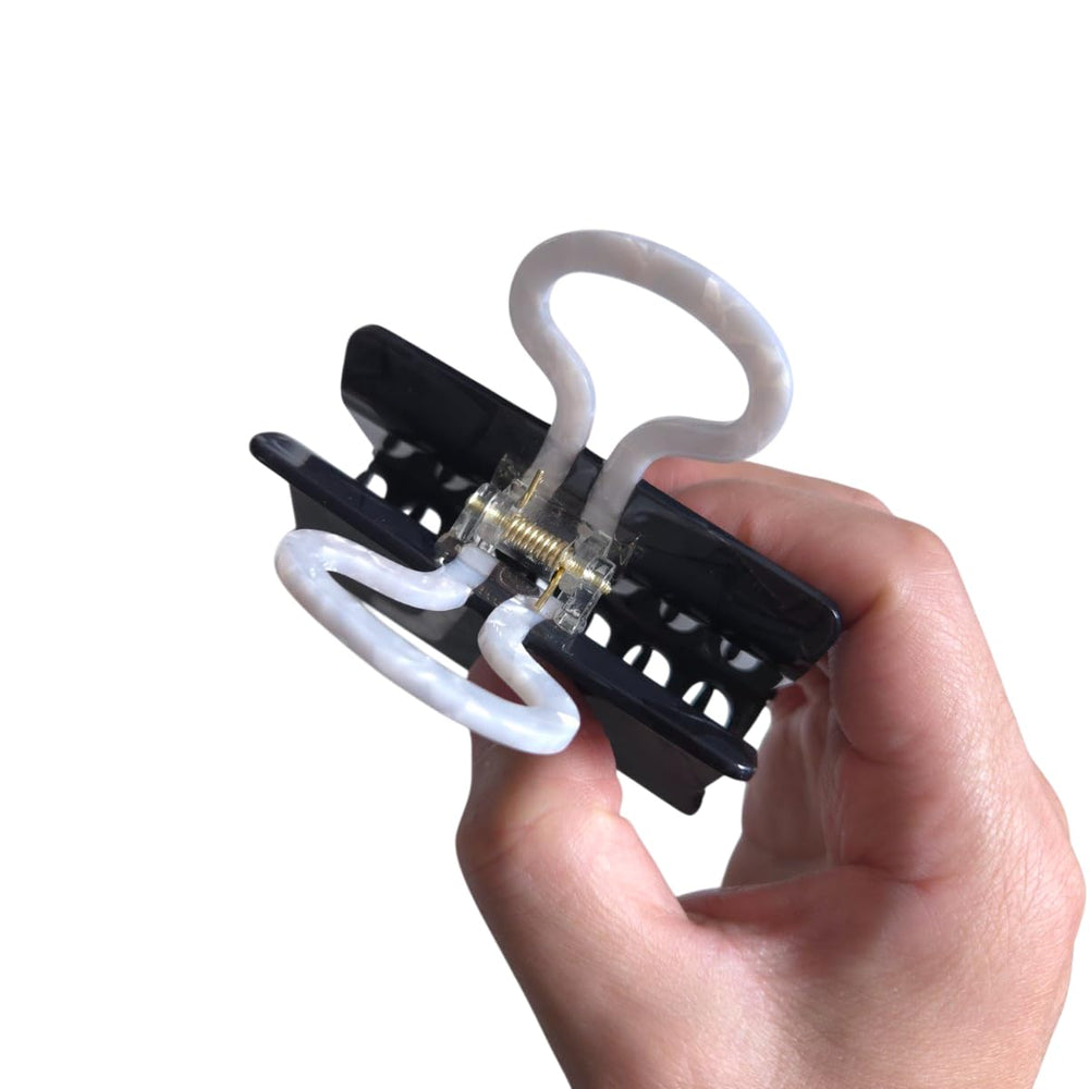 Clip Sugar worn in a half-up hairstyle demonstrating secure hold and fashionable look