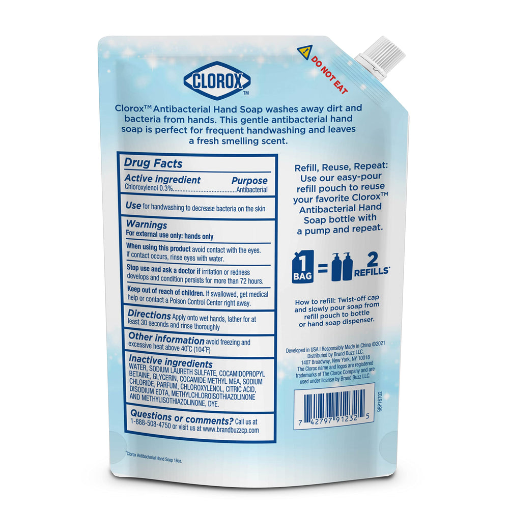 Clorox 34 oz bottle next to everyday items for scale, shows value-size refill capacity