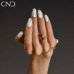 CND Vinylux Studio White swatch on toe showing versatile use benefit