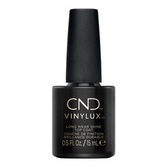 CND Vinylux brush applying top coat for smooth coverage and fast application