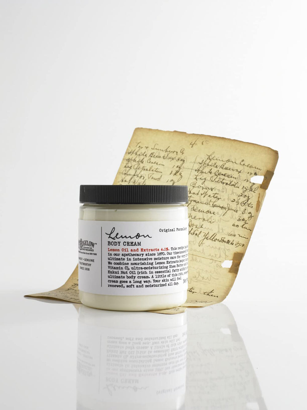 C. O. Bigelow jar beside a ruler to show 8 oz size for home use convenience