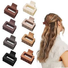 Cobinaan front view of eight matte rectangle claw clips showing warm color set and tidy storage benefit