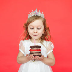COCIDE model wearing sash and tiara at party showing instant celebratory style boost