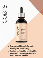 Coera bottle held in hand to show true-sized 2 fl oz and scale