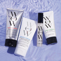 COLOR WOW One Minute Transformation cream texture on fingers for quick smoothing benefit