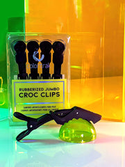 Colortrak stylist using a clip to section thick hair for efficient processing