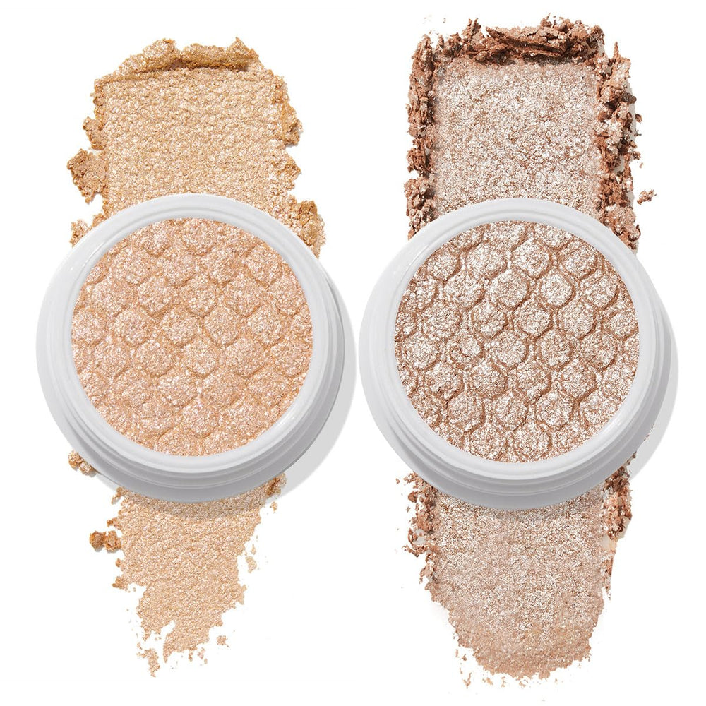 ColourPop compact held between fingers showing product scale and travel-friendly size