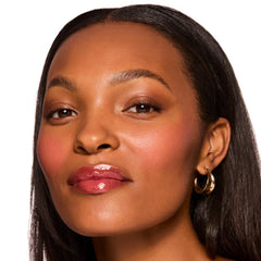 ColourPop Fresh Kiss Wild Berry swatched on lips for subtle color benefit