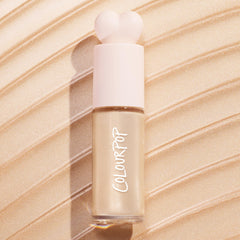 ColourPop Hi-Lite bottle beside lotion showing size and dilution option