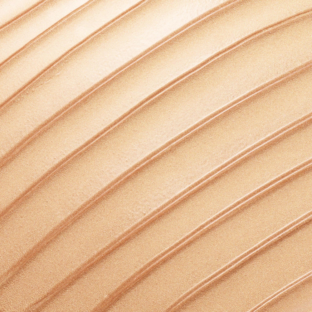 ColourPop Hi-Lite liquid dropper close-up showing dewy texture and blendability