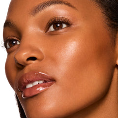 ColourPop Hi-Lite swatch on hand showing reflective glow and skin-enhancing finish