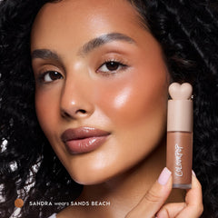 ColourPop liquid bronzer open dispenser revealing nozzle and drop of product for controlled application
