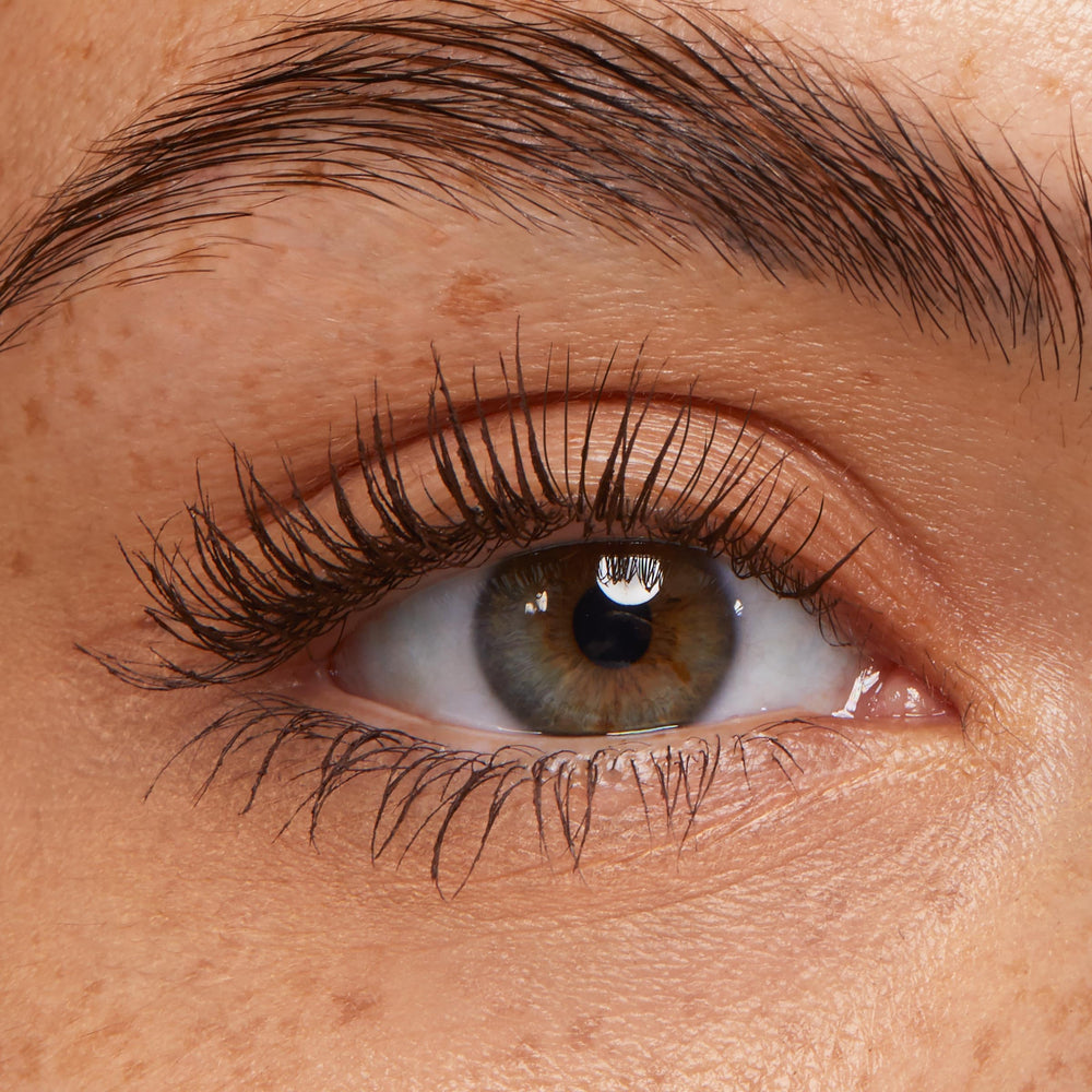 ColourPop brown mascara swatch on skin showing pigment depth and buildable coverage
