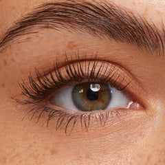 ColourPop brown mascara swatch on skin showing pigment depth and buildable coverage