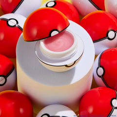 ColourPop Poké Ball lip mask styled flatlay highlighting collectible, gift-ready appeal