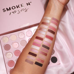 ColourPop palette with brush applying shade from Smoke N Roses demonstrating easy application control