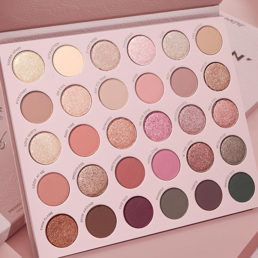 ColourPop swatch of Smoke N Roses metallic on eyelid showing reflective color and long-wear benefit