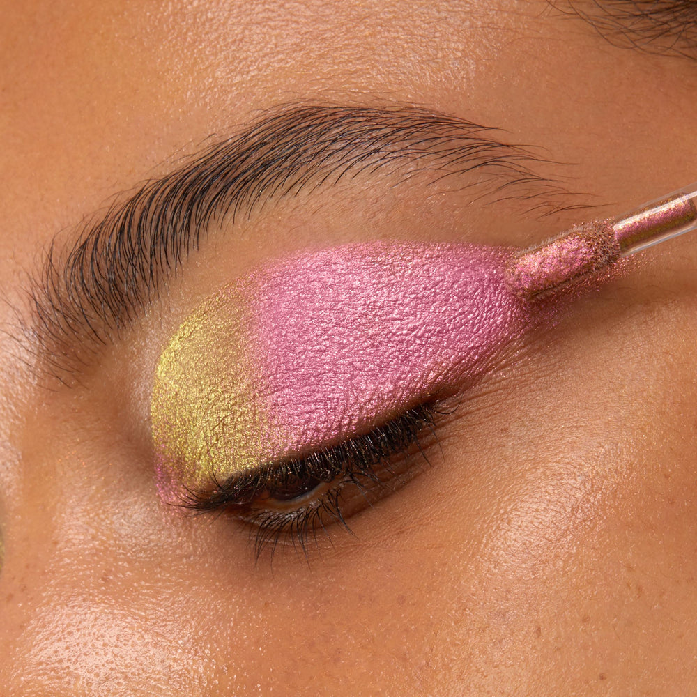 Model wearing ColourPop Bliss on lids showing striking color-shift payoff
