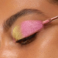 Model wearing ColourPop Bliss on lids showing striking color-shift payoff