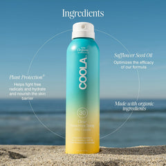 COOLA bottle in hand to show 6 fl oz travel-friendly size and portability