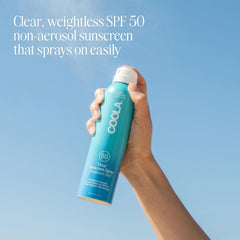 COOLA clear sunscreen spray texture displaying lightweight finish and quick absorption
