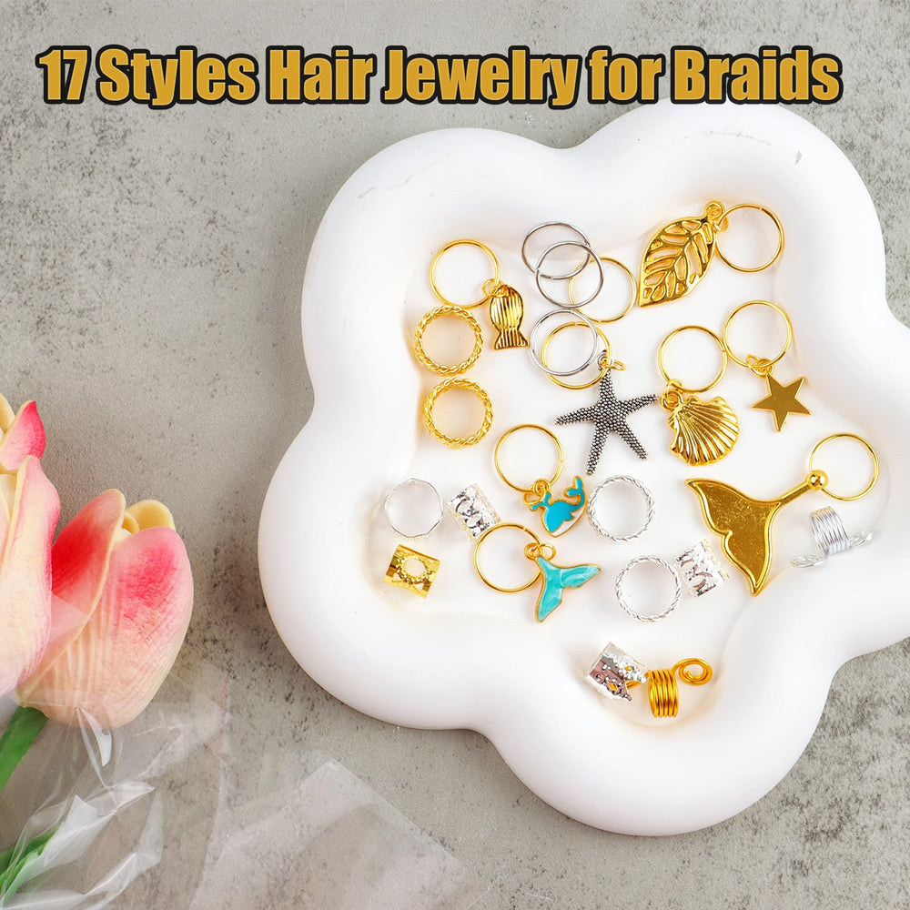 Coriario assorted gold and silver rings and cuffs spread in compartments highlighting variety and choices