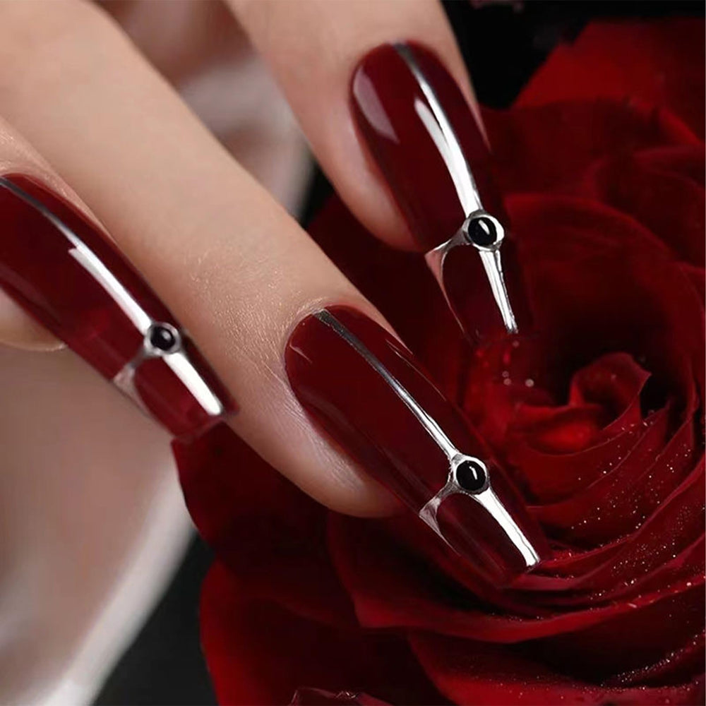 COSMOO swatch on nail wheel showing true cherry red payoff benefit