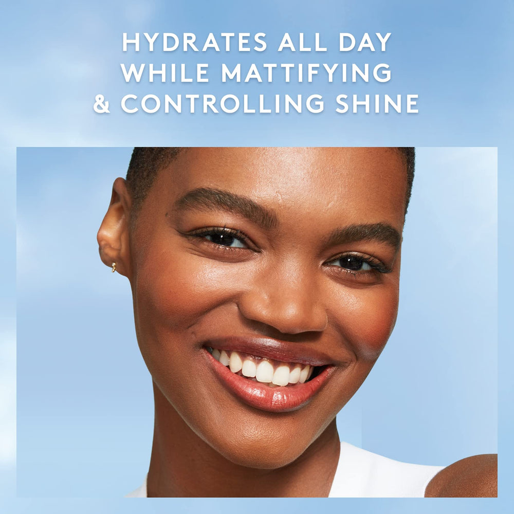 COVERGIRL moisturizer on fingers showing easy spread and absorption