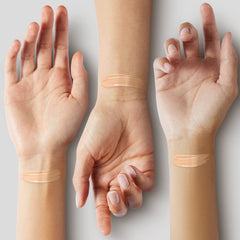 COVERGIRL swatch on forearm showing Soft Tan shade and even coverage