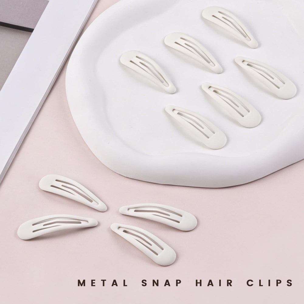 Cptots clips array top view showing uniform matte white design for styling