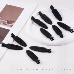 Cptots clips in hand size comparison illustrating compact travel convenience