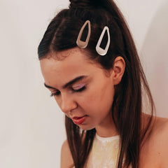Cptots clipped in hair half-up style showing neat hold and styling benefit