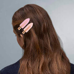 Cptots clip size compared with hand to show compact travel-friendly benefit