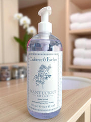 Crabtree & Evelyn bottle staged on bathroom counter, suggests everyday luxury
