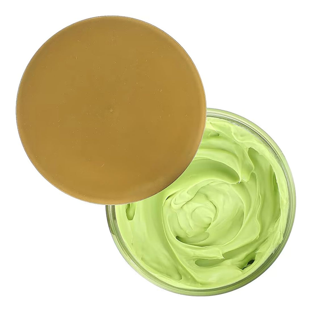 Creme of Nature close-up of cream texture on fingertip, demonstrates smooth moisture delivery