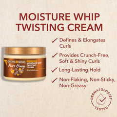 Creme of Nature styling cream on palm ready to apply for defined twists