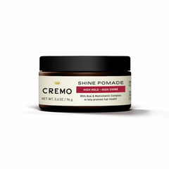 Cremo pomade side part detail showing defined separation and controlled shine