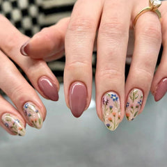CTTHNBD close-up of floral pattern detail on a nail, showing intricate printed design