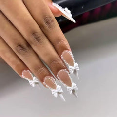 CTTHNBD front packaging showing 24 white French tip nails and included tools for easy styling