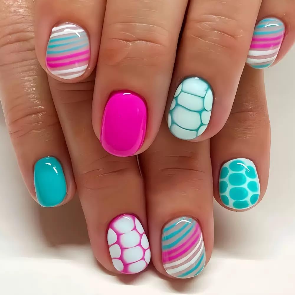 CTTHNBD hand model wearing mixed nails showing versatile summer manicure options