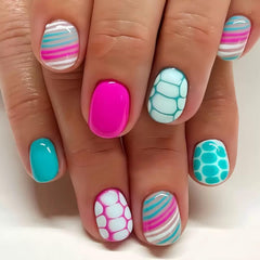 CTTHNBD hand model wearing mixed nails showing versatile summer manicure options