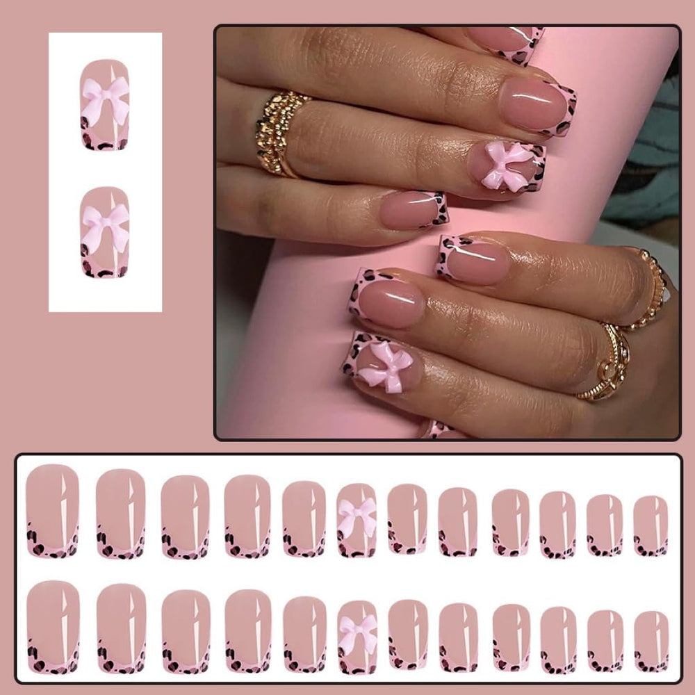 CTTHNBD arranged nail set top view displaying leopard French tips and glossy bow for inspiration