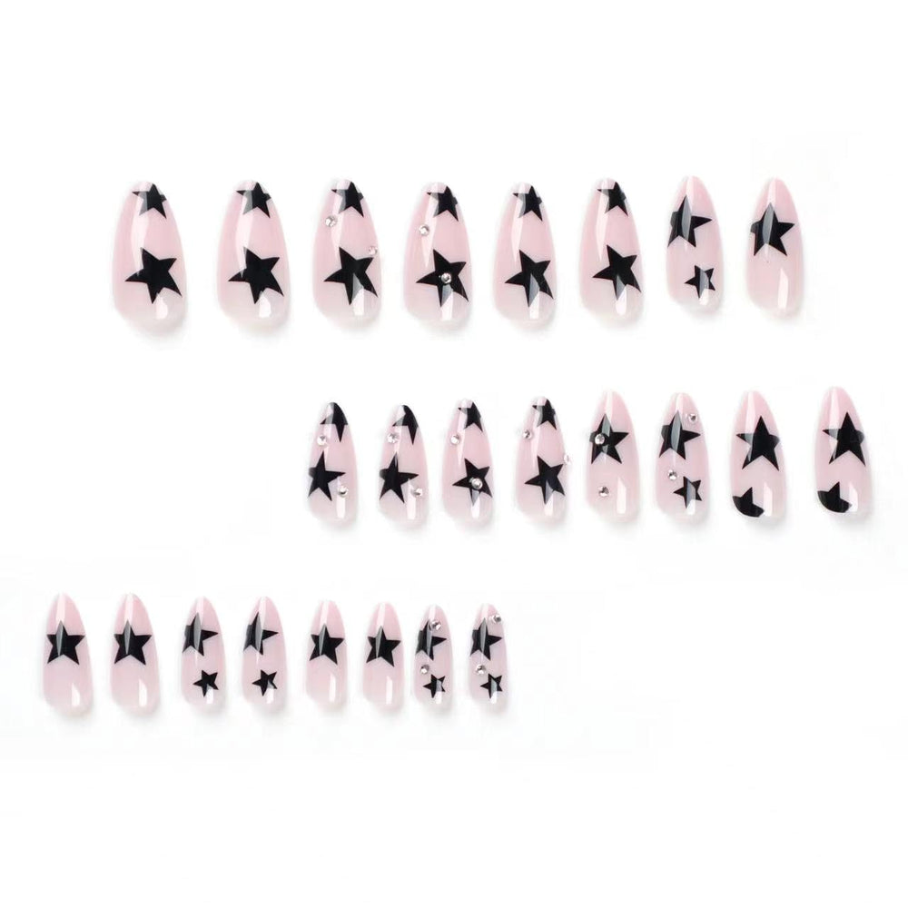 CTTHNBD nails worn on model hand demonstrating almond shape and natural elongation