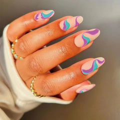 CTTHNBD swirl accent nail close-up showing color depth and artistic design