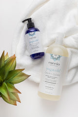 Cuccio 8 oz bottle in hand showing product size and travel-friendly wellness benefit